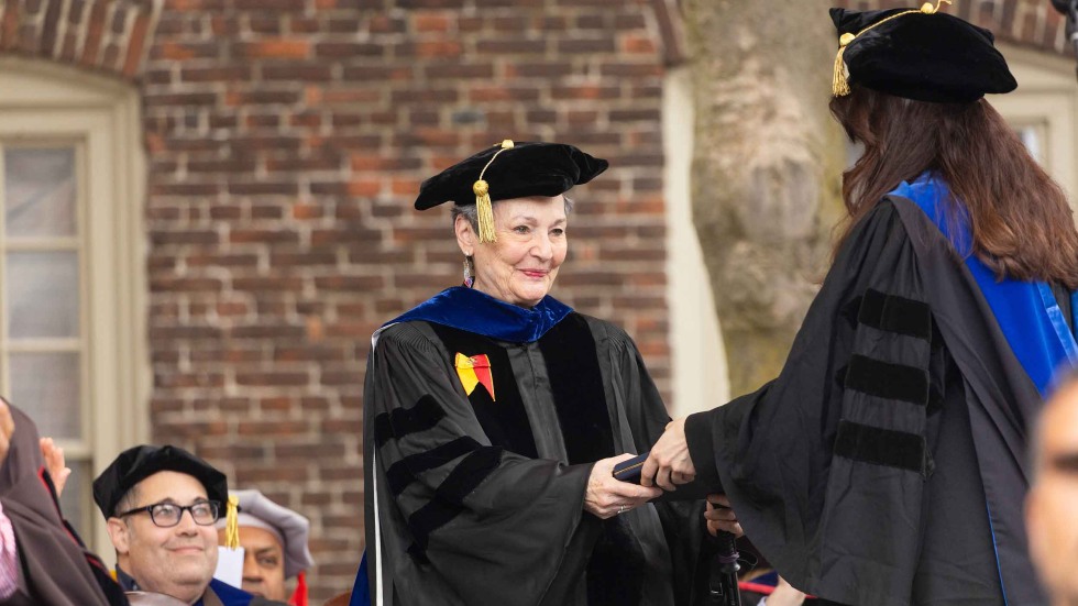 Terrie Fox Wetle receiving Rosenberger medal