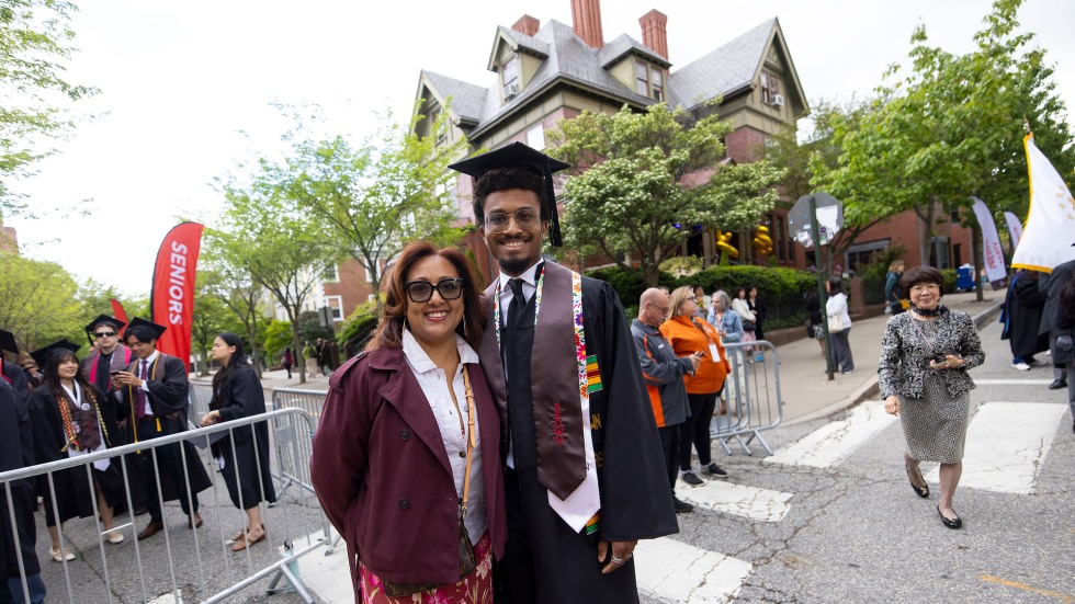 Alejandro Jackson stands with his mom in 2025