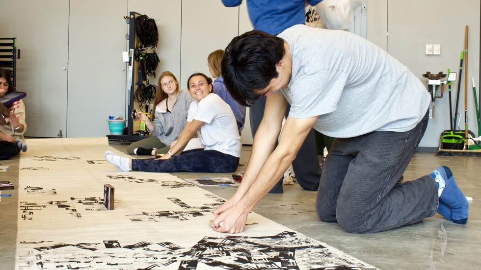 Students creating a mural