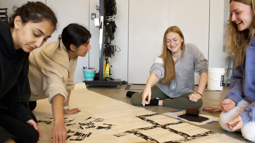 Students creating a mural