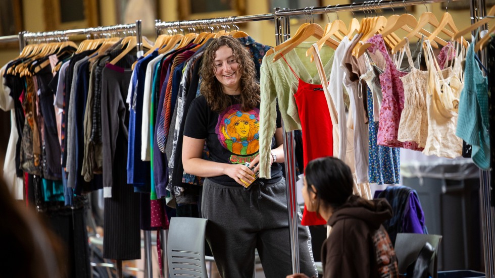 Jesse Rusche stands by her vendor booth