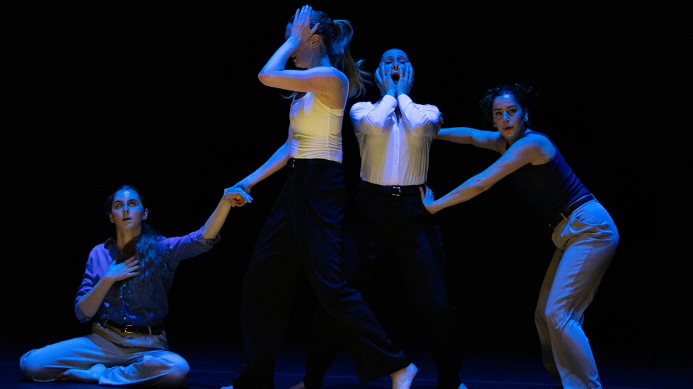 Four dancers perform