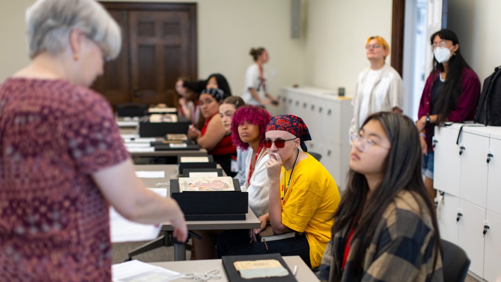 Group of Pre-College students in Hay Library 