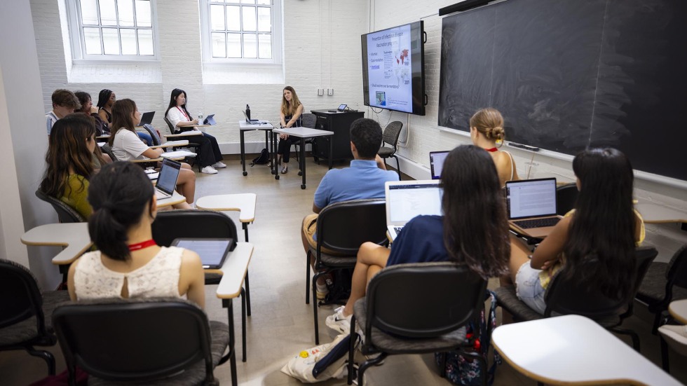 students listen to a lecture in a Brown classroom