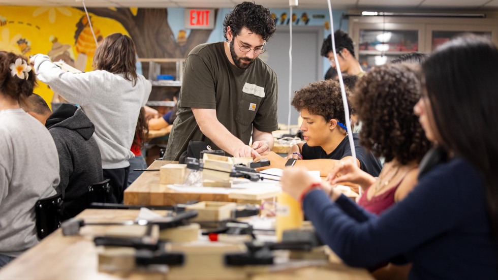 students learn woodworking in the Brown Design Workshop