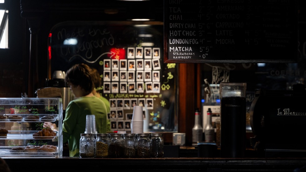 Polaroid photos of the Underground staff at the coffee counter