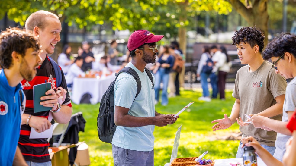 Brown students stop at information tables to learn about resources for living off campus.