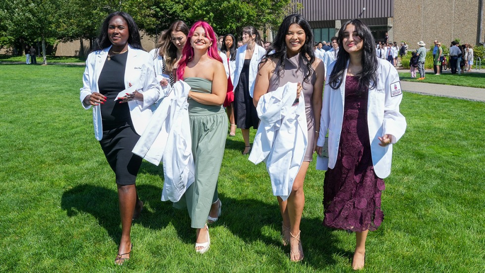 students at white coat ceremony