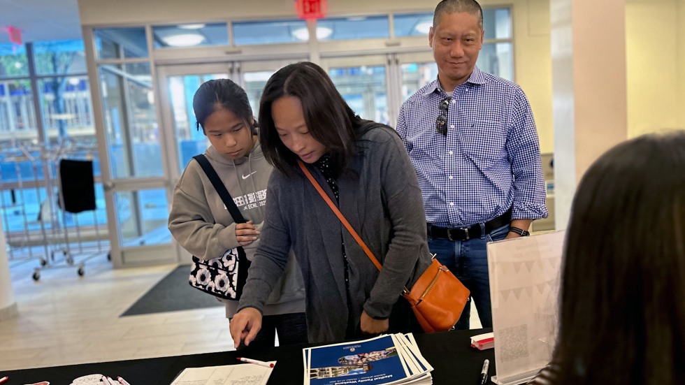 people at check-in table