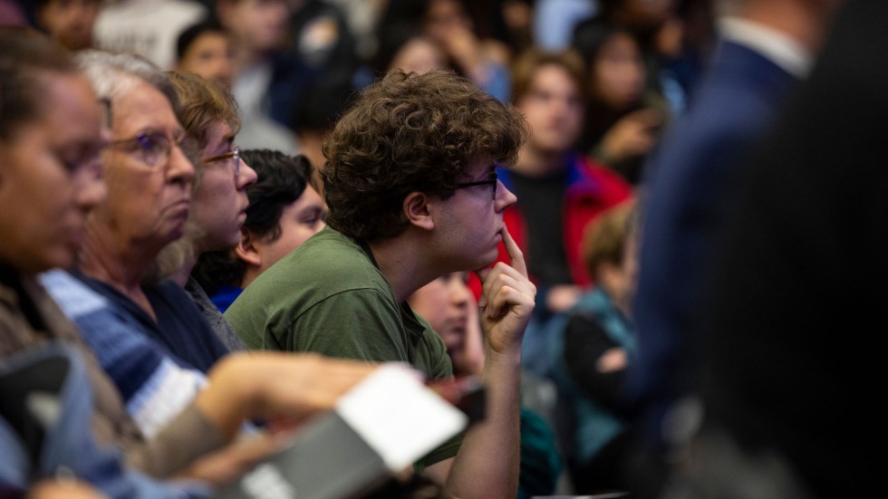 Audience member listening to Ogden Lecture