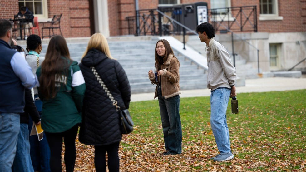 people on a campus tour in front of the Faunce Steps