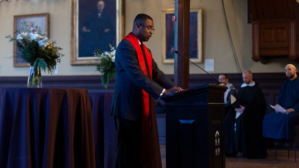 faith leader at podium