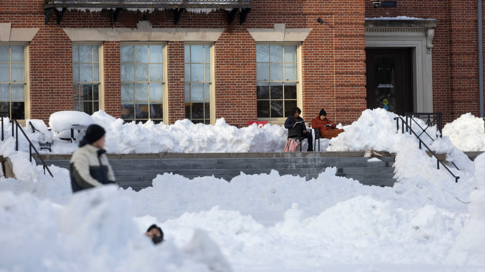 people sit outside the campus center