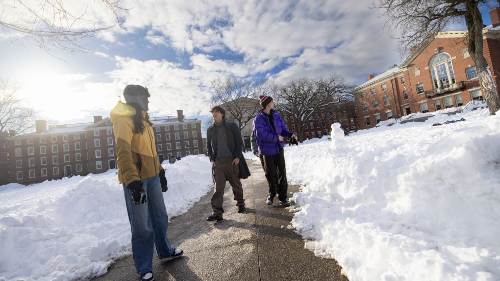 Students gather on the snowy campus