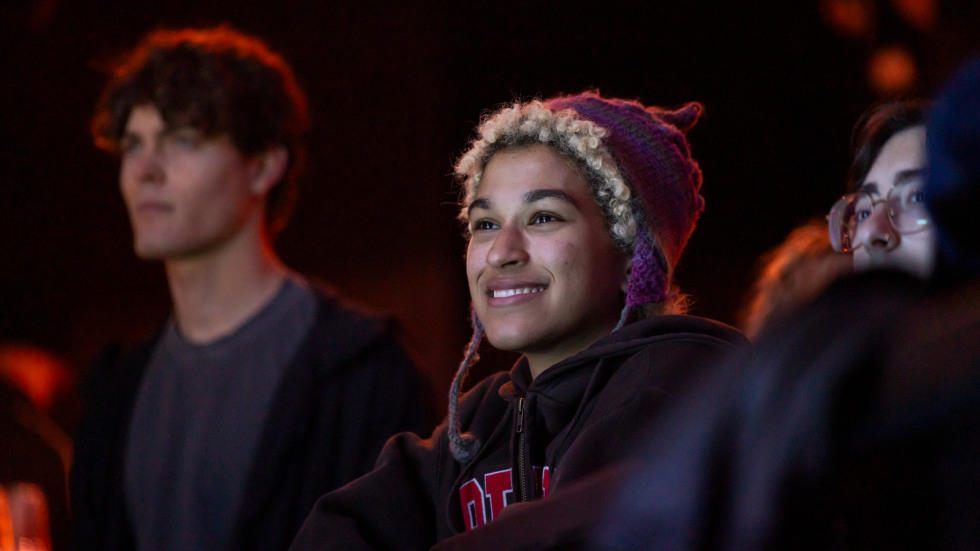 Spectator watches performances at benefit concert