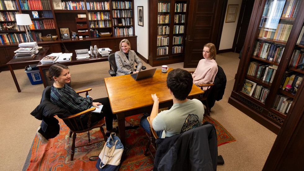 Brown 2026 project team meets at a table 