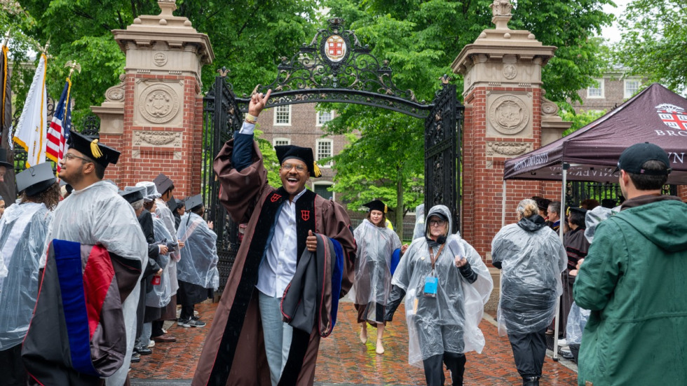 student cheering in the procession