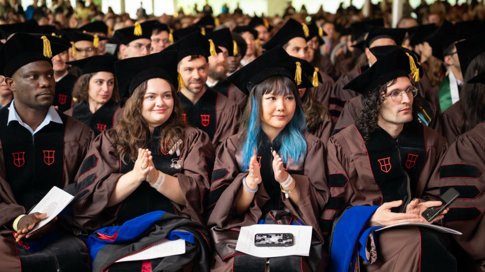 Students in regalia seated at the Doctoral Ceremony