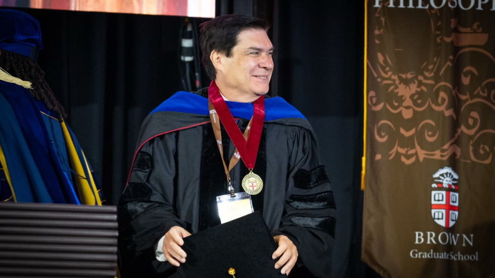 Dr. Horacio Espinosa wearing the Horace Mann Medal
