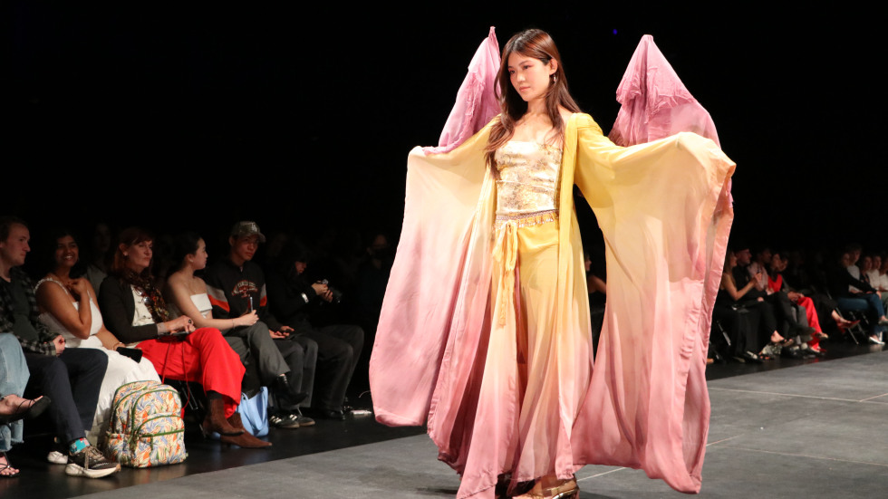 student modeling a dress 
