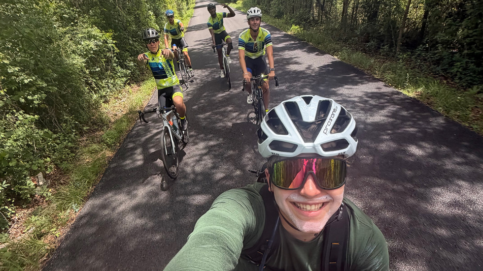 A group of cyclists join Lachlan Kirby for a stretch in Florida