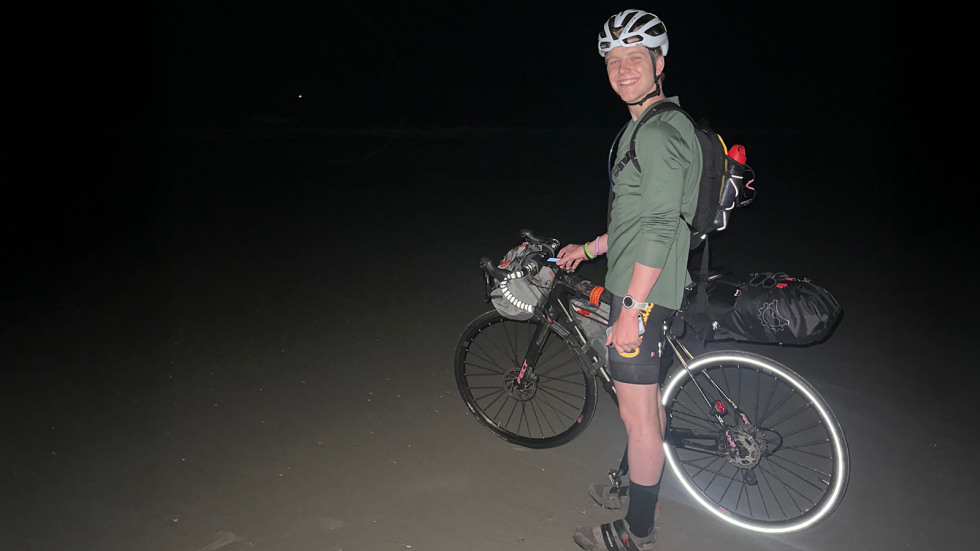 Shot of Lachlan Kirby on bike at night 