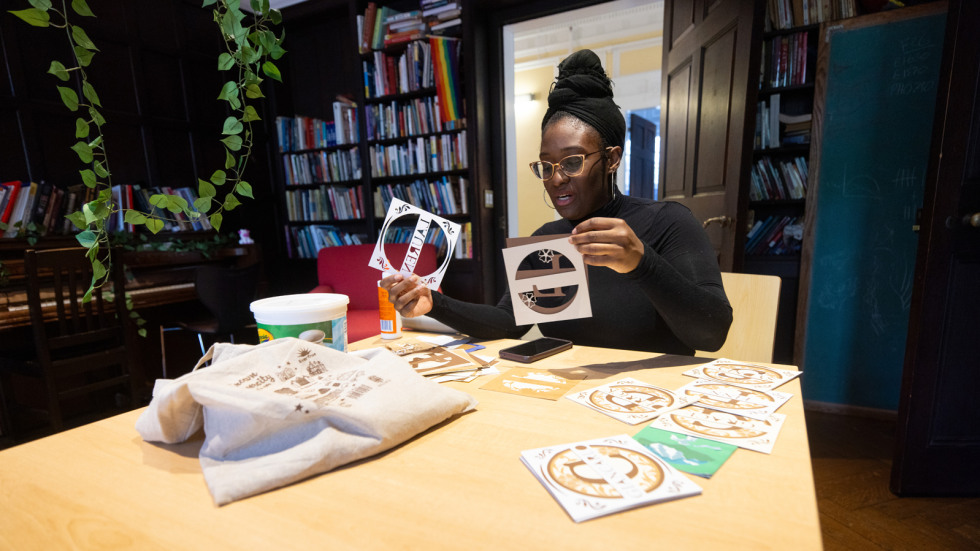 Teniesea holds up crafts