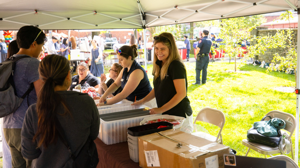 Volunteers staff the check-in tent 
