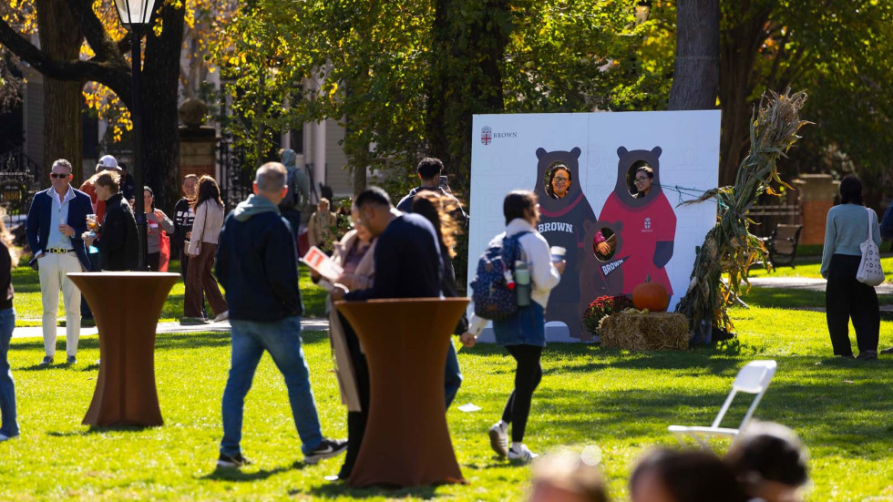 A cut out of bears and families enjoying taking photos