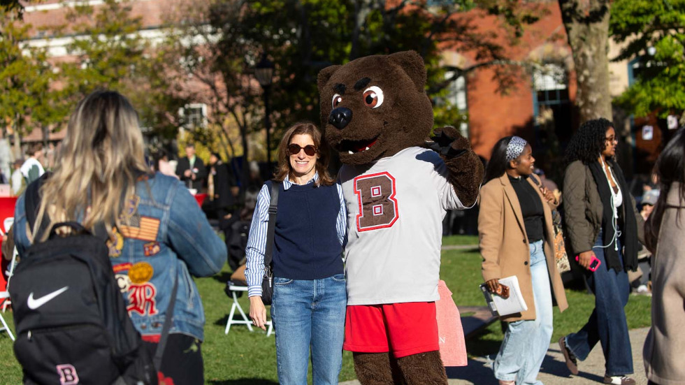 Parents pose for a photo with Bruno.