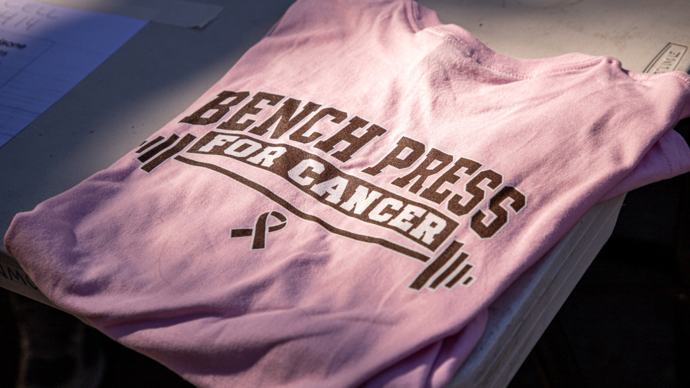 a pink tshirt showing brown football logo