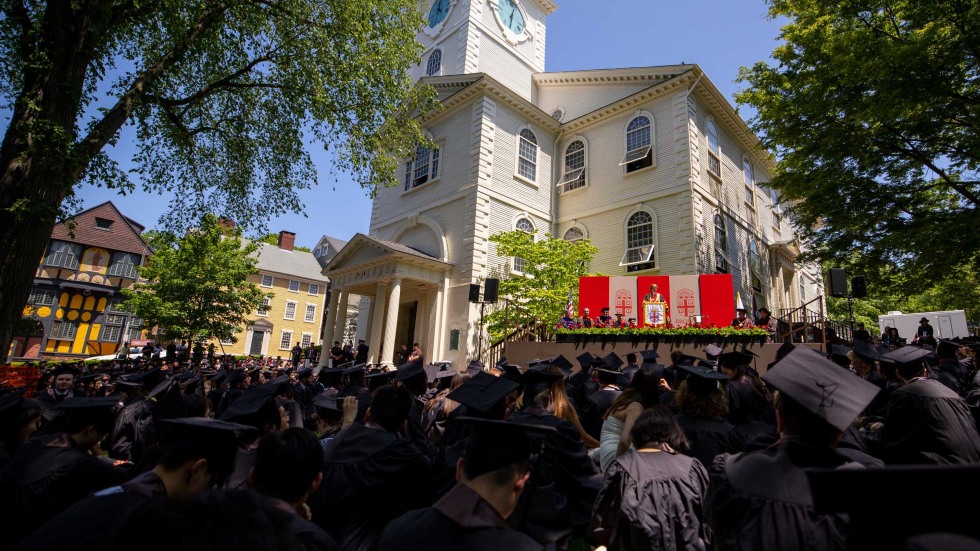 President Paxson speaking before graduating students