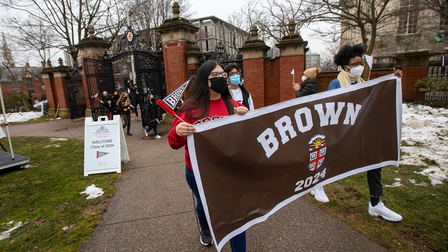 With pandemic safety protocols in place, firstyear students walk