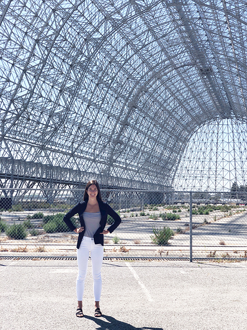 Ariel Deutsch standing in a hangar