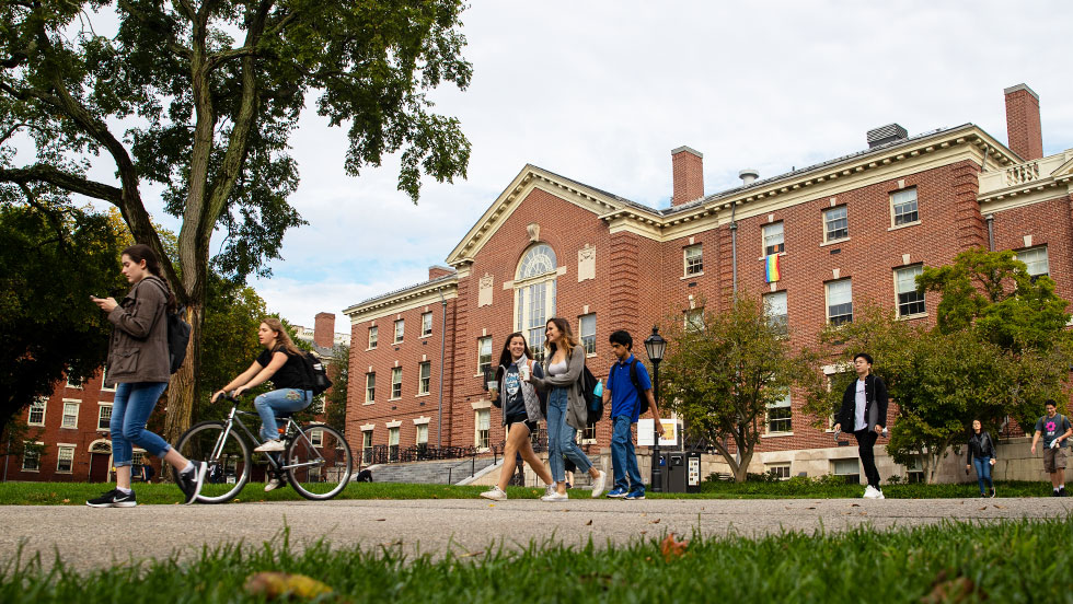 Students walking across the green on Brown campus