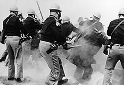 Police wielding batons in Selma, Alabama, in 1964