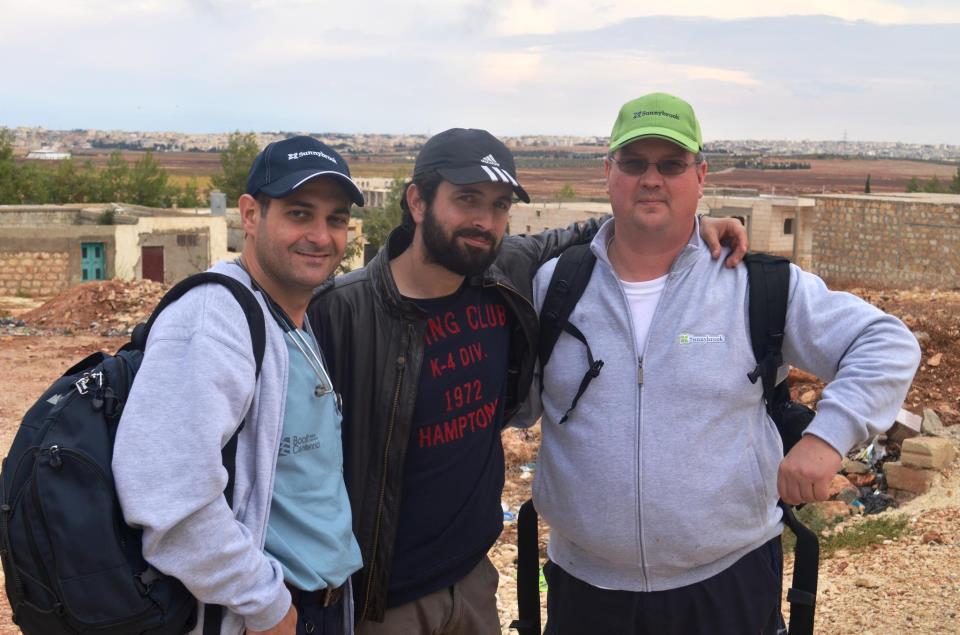 Khaled Almilaji, Jay Dahman and Mark Cameron in the desert