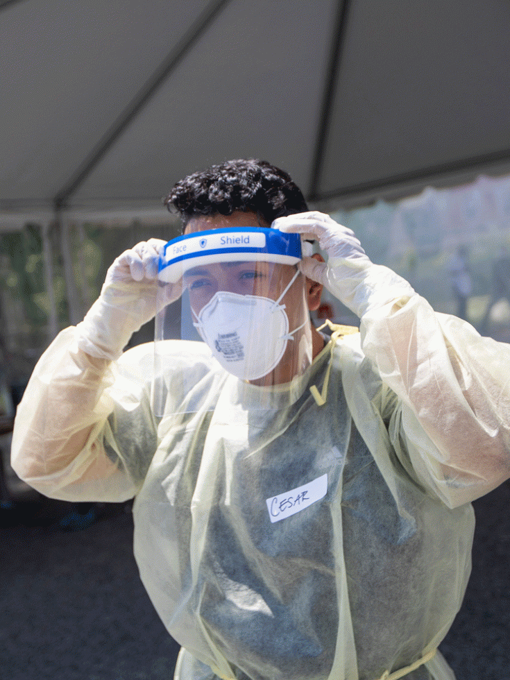 Man in full personal protective equipment