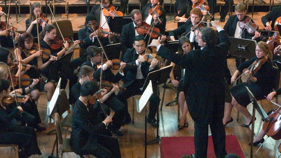 Orchestra with conductor
