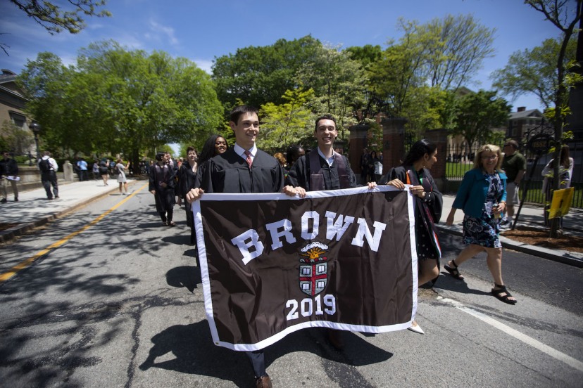 Members of the Class of 2019 carry their class banner in the Baccalaureate procession.
