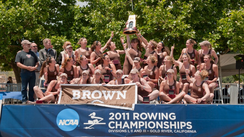 women's rowing team standing on dais