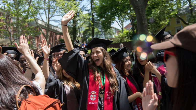 Student celebrating during Commencement