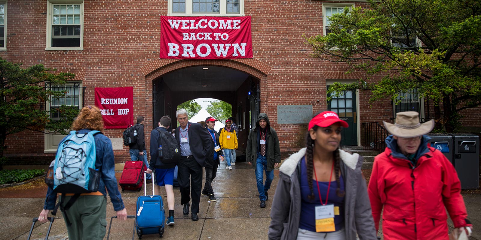 Near Wayland Arch, current Brown students helped alumni returning for Reunion Weekend get settled in.