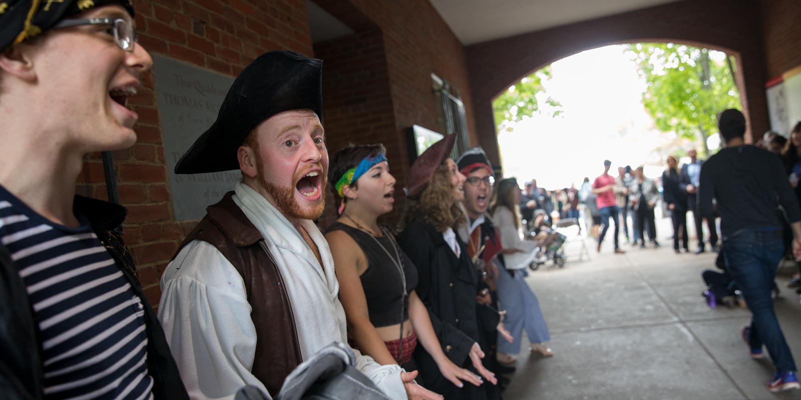 Members of ARRR!, Brown's only pirate a capella group, performed for a crowd near Faunce Arch.