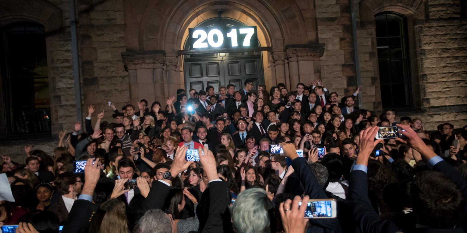 Moments before the annual Senior Sing tradition happened at midnight during Campus Dance, members of the Class of 2017 posed for pictures on the steps of Sayles Hall.