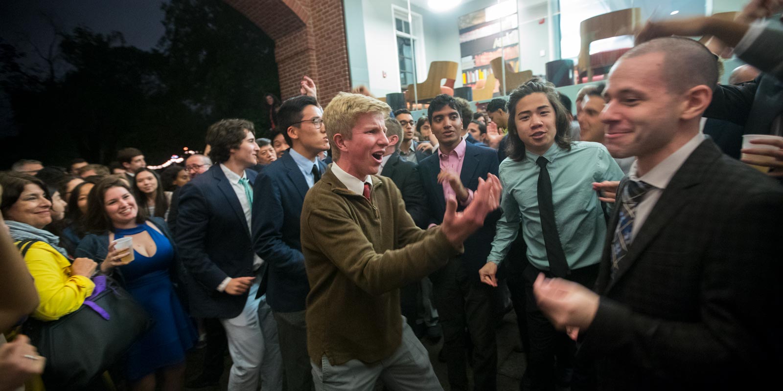Undergraduate Kevin Cowles and other members of the Brown Derbies performed for a crowd gathered under Faunce Arch during Campus Dance.