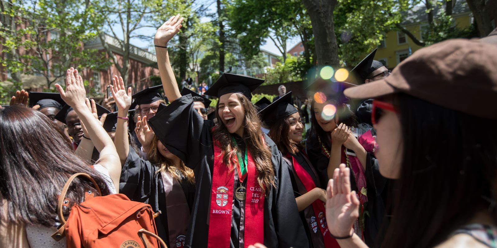 Graduating senior Fabiola Porras, who earned a bachelor of science degree, celebrates a degree hard earned.