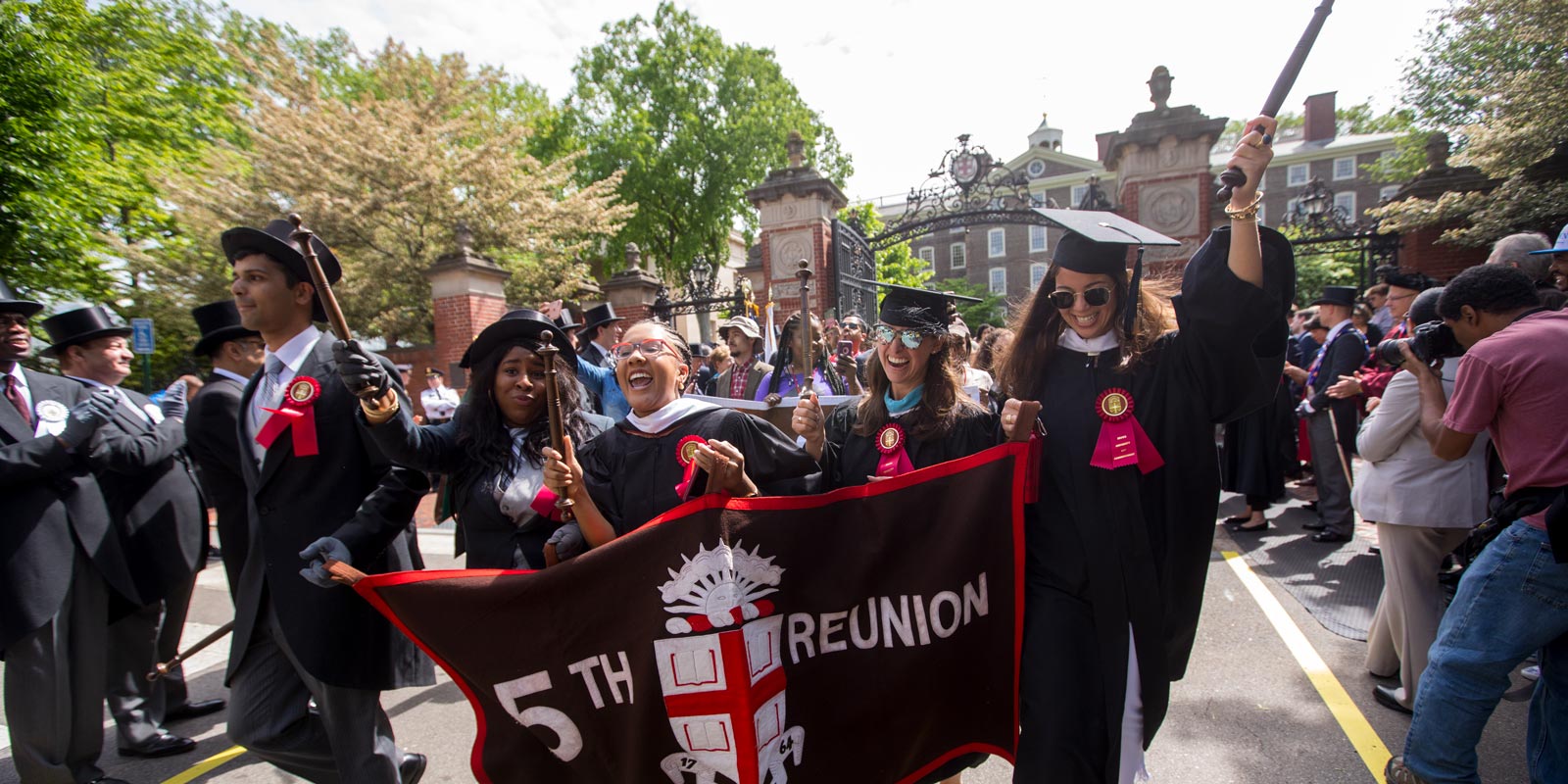 Classmates celebrating their fifth reunion processed through the Van Wickle Gates and down College Street on Sunday morning.