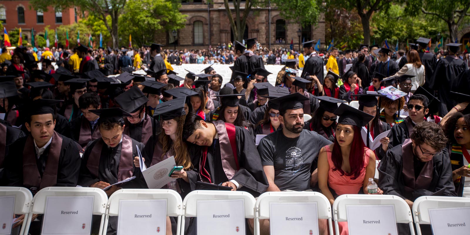 Graduates on the College Green awaited the start of the University Ceremony, which preceded departmental diploma ceremonies held across campus in the hours following